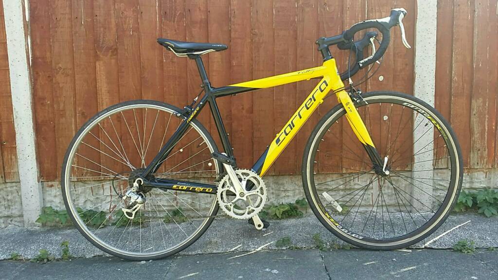 carrera black and yellow road bike
